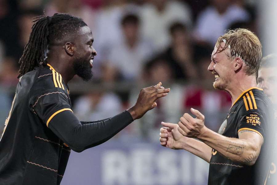 Tolu and Julian Brandt celebrate the Nigerian's goal against Sion