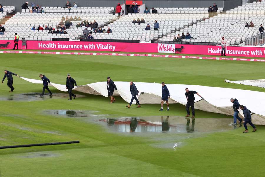 Some rain covers are removed as the third Twenty20 International match between England and Australia is abandoned