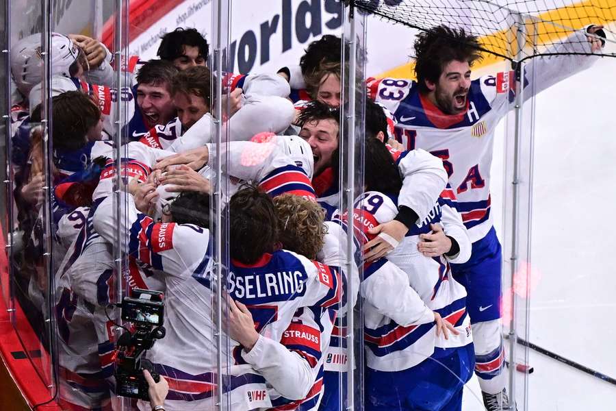 The USA players celebrate their winning goal against Switzerland in the Final The USA players celebrate their winning goal against Switzerland in the Final