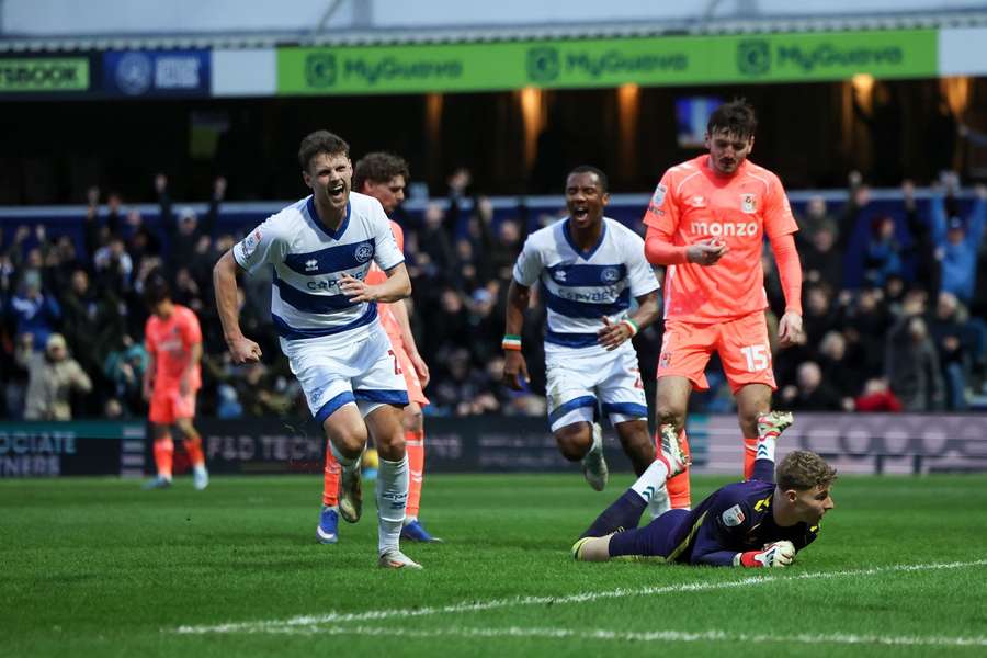 Nicolas Madsen of QPR scores and celebrates
