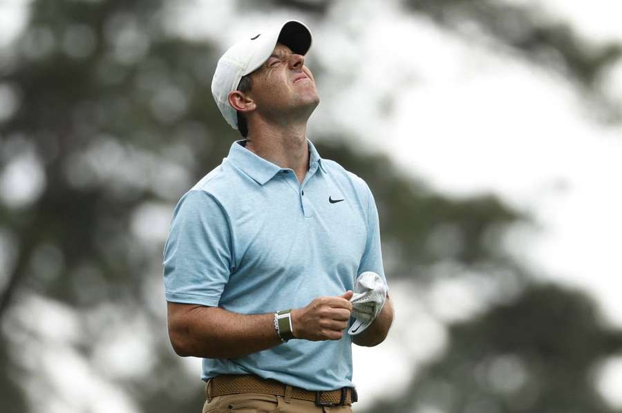 Northern Ireland's Rory McIlroy reacts after hitting his tee shot on the 4th hole during the first round