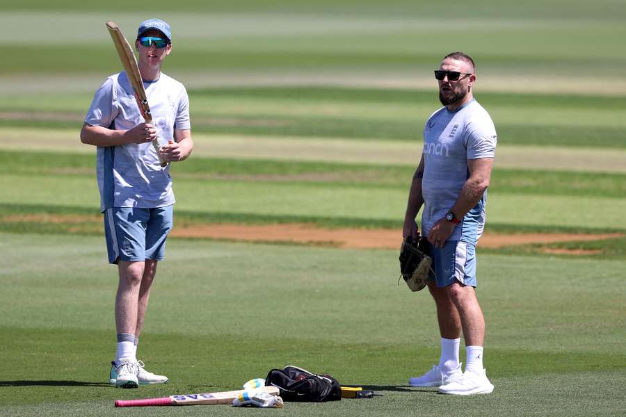 Harry Brook (l) and Brendon McCullum during England training