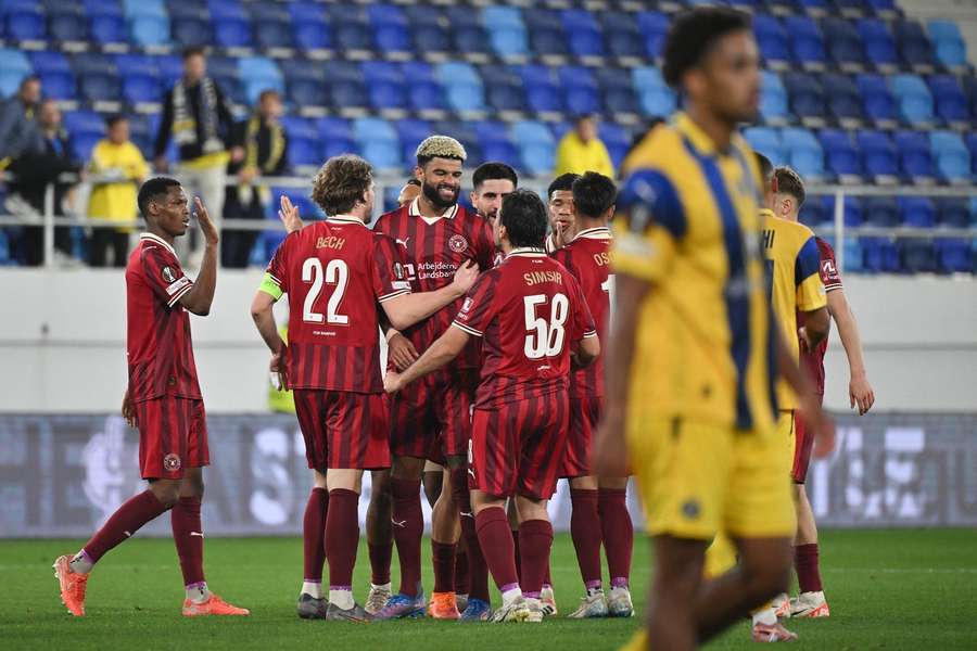Midtjylland's Danish midfielder Philip Billing (C) celebrates with teammates after scoring his team's second goal Midtjylland's Danish midfielder Philip Billing (C) celebrates with teammates after scoring his team's second goal
