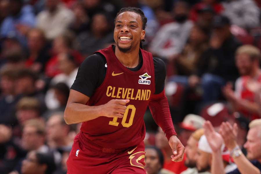 Cleveland Cavaliers guard Darius Garland smiling after a basket