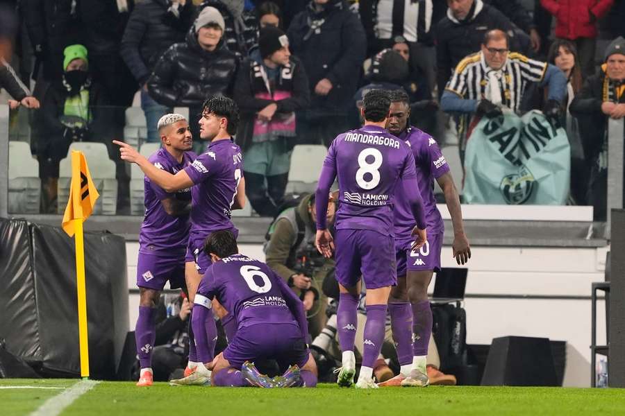 Fiorentina celebrate their late equaliser