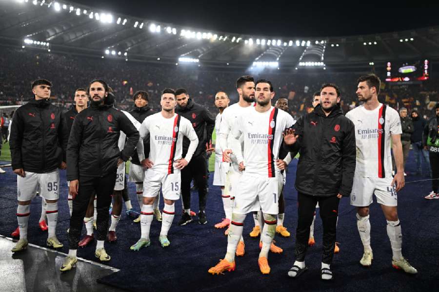 AC Milan's Theo Hernandez with teammates look dejected Europa League exit