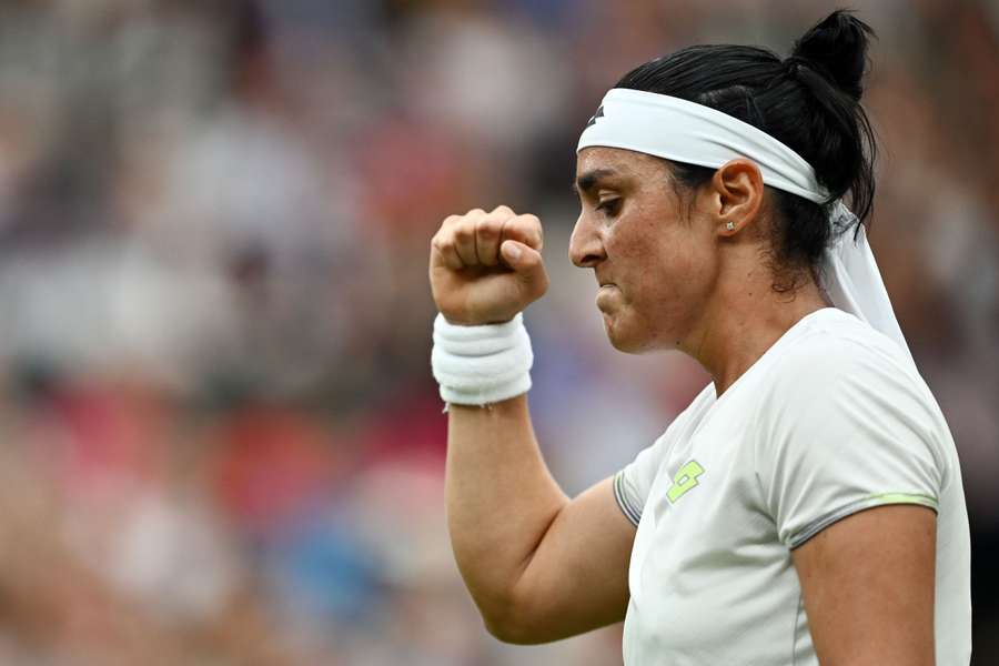 Ons Jabeur celebrates winning a point against Marketa Vondrousova