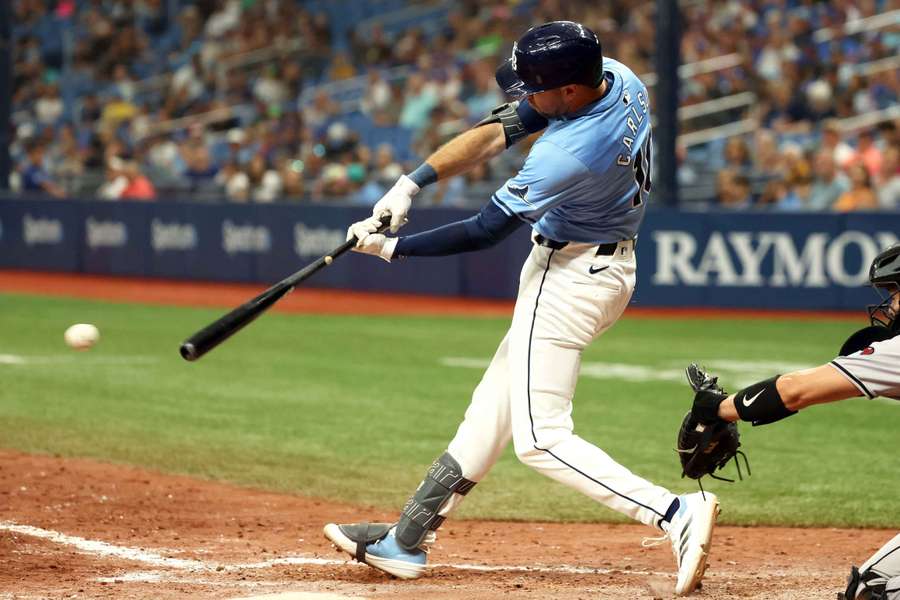 Dylan Carlson singles against the Arizona Diamondbacks during the 10th inning at Tropicana Field