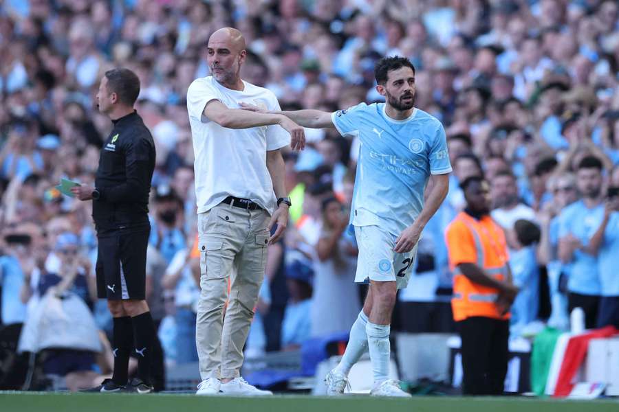 Pep Guardiola and Bernardo Silva embrace in their final match for Man City Pep Guardiola and Bernardo Silva embrace in their final match for Man City