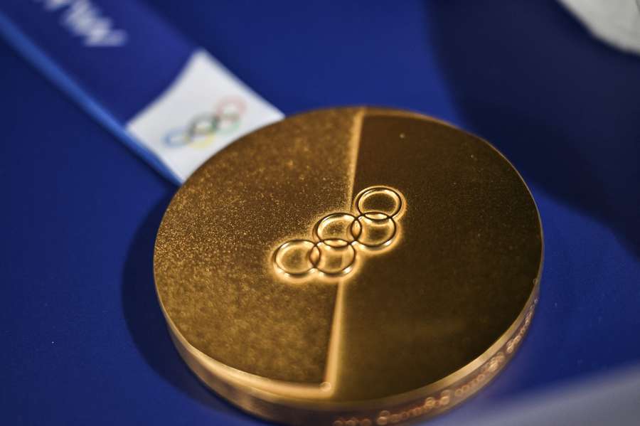 A picture shows the gold medal at the 2026 Winter Olympic Games