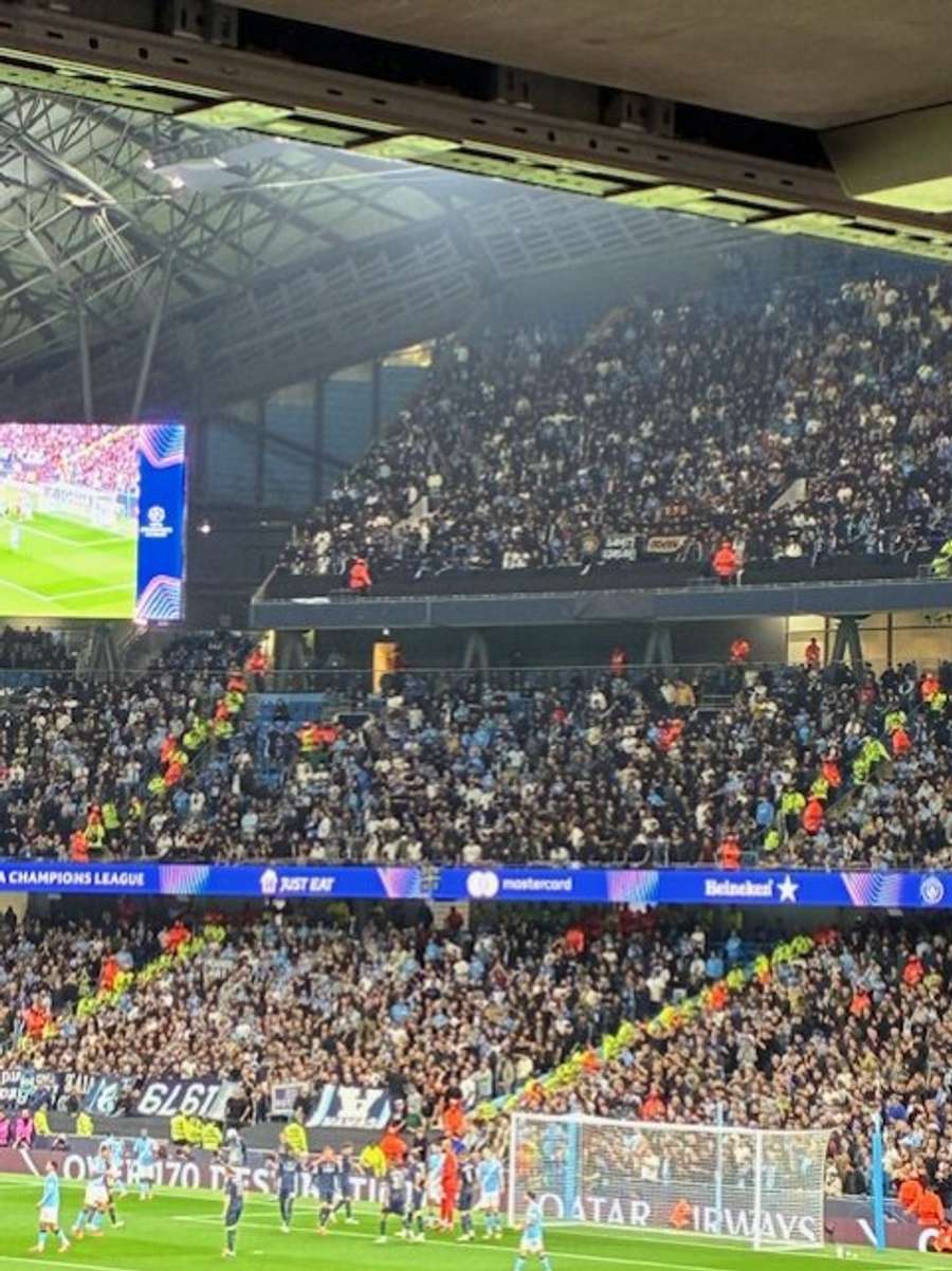 Three tiers of Napoli away fans
