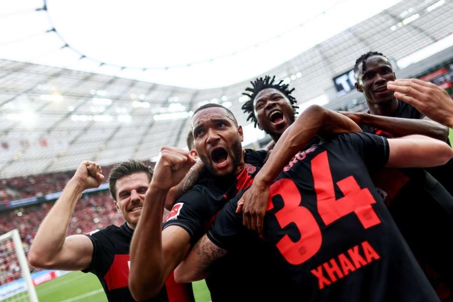 Bayer Leverkusen's first-ever league champions celebrate their second goal 