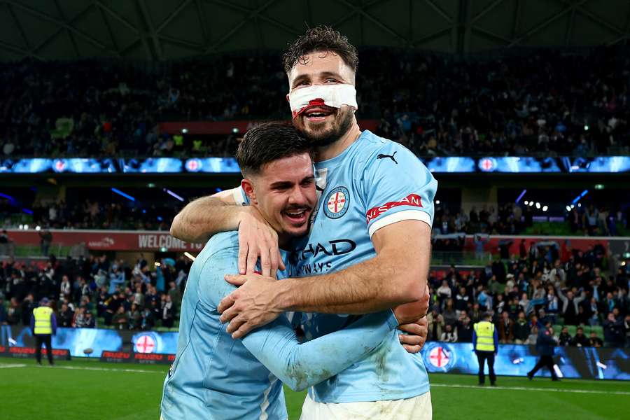 Mathew Leckie celebrates winning the A-League Men Grand Final in 2025