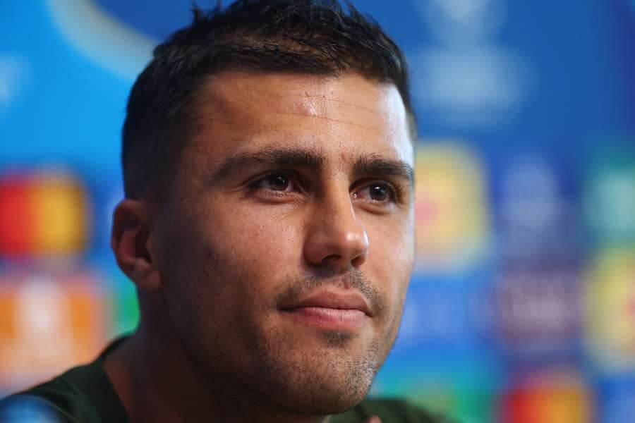 Rodri speaks during a press conference