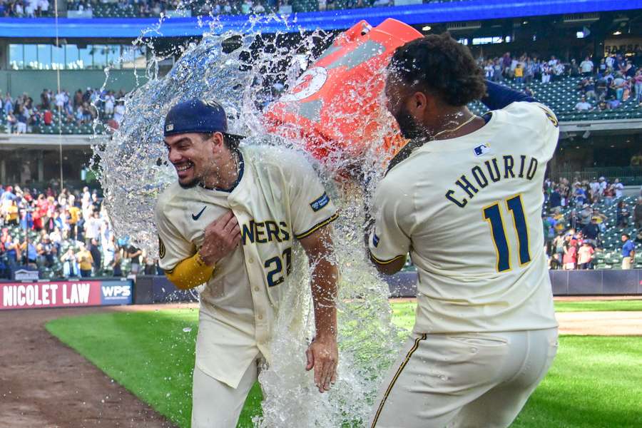 Willy Adames is showered by Jackson Chourio