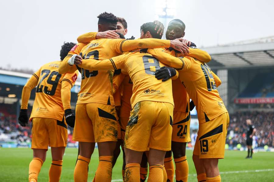 Wolves players celebrate after scoring Wolves players celebrate after scoring