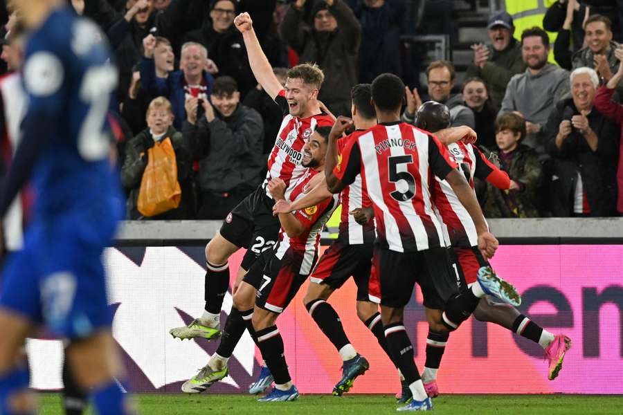 Nathan Collins celebrates restoring Brentford's lead in the 70th minute