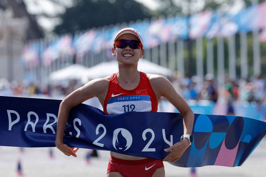 Yang Jiayu celebrates after winning gold