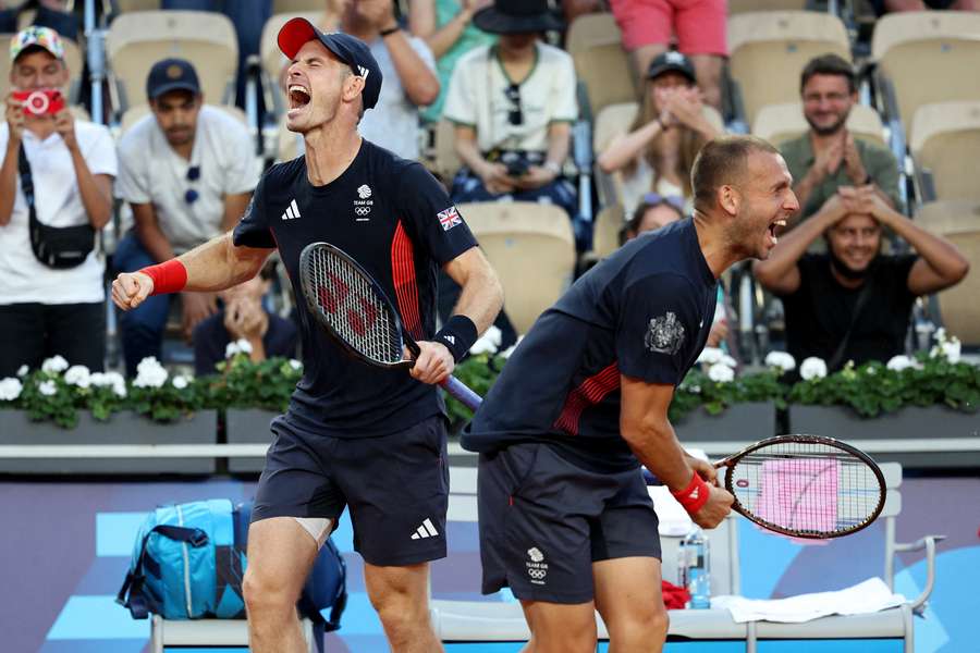 Andy Murray and Dan Evans celebrate their win in Paris