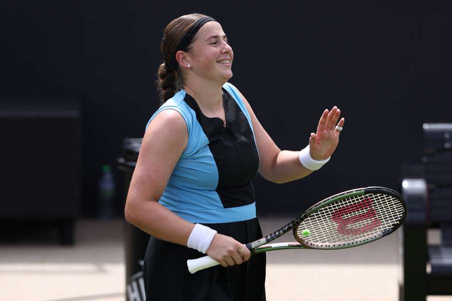 Jelena Ostapenko smiles as she beats Anastasia Potapova to reach the final