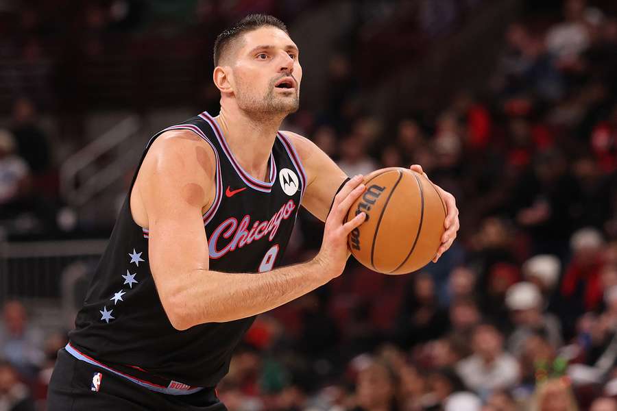 Former Bulls centre Nikola Vucevic shoots a free throw