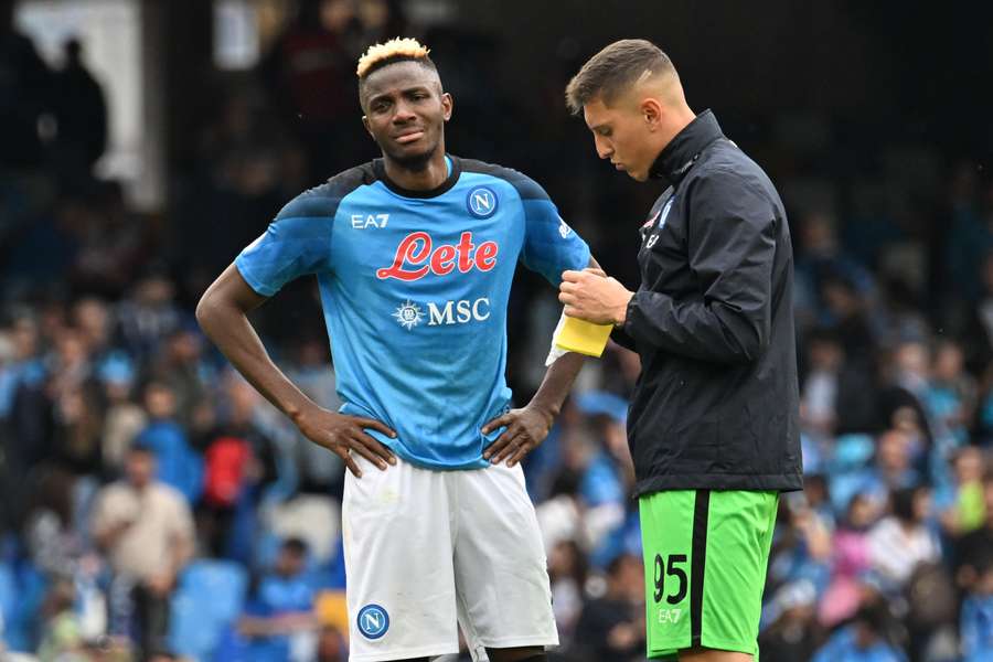 Napoli forward Victor Osimhen (L) and goalkeeper Pierluigi Gollini