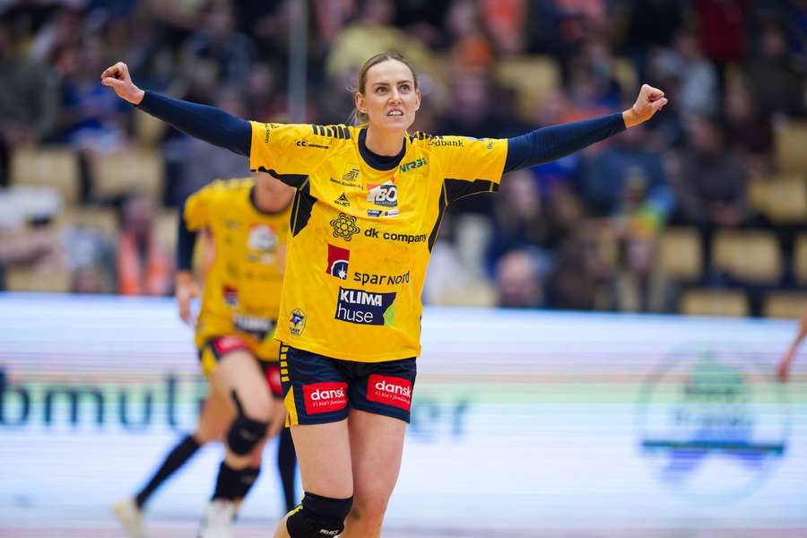 Ikast Handball's Emilie Arntzen celebrates scoring against the Slovenians