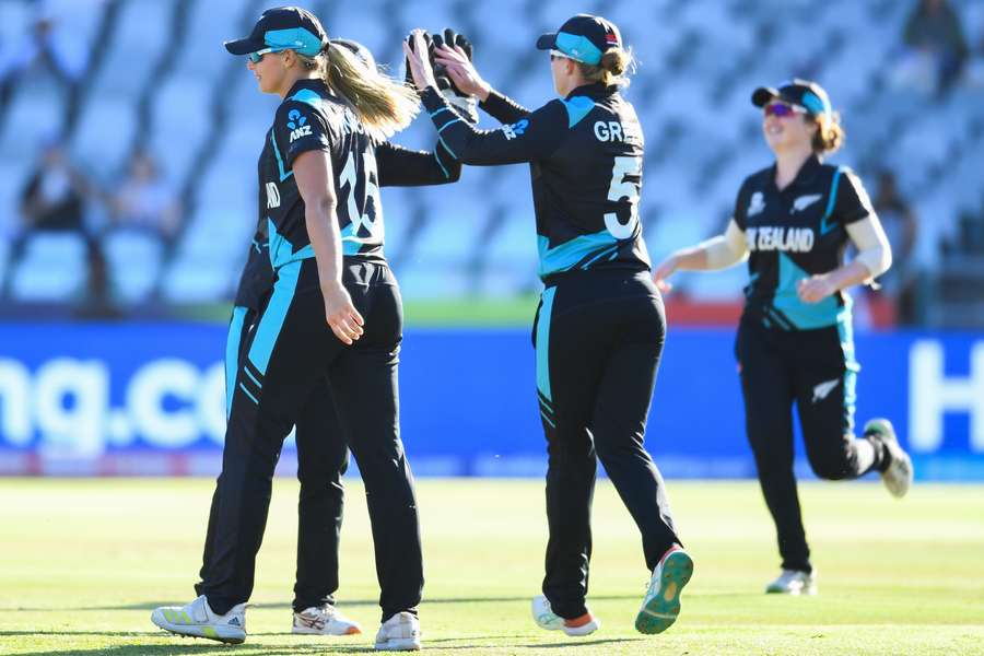 New Zealand's players celebrate a wicket against Bangladesh