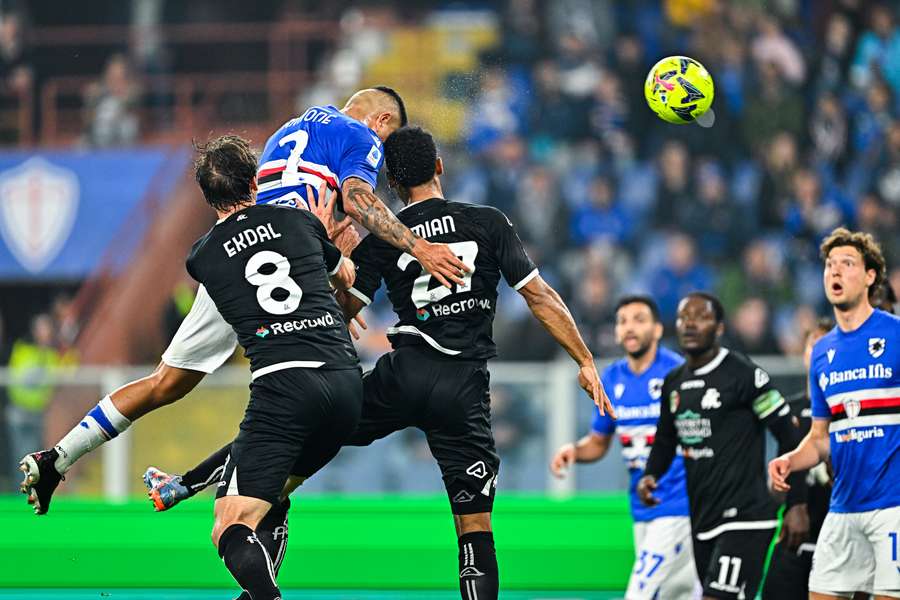 Bruno Amione heads home the game's opener for Sampdoria