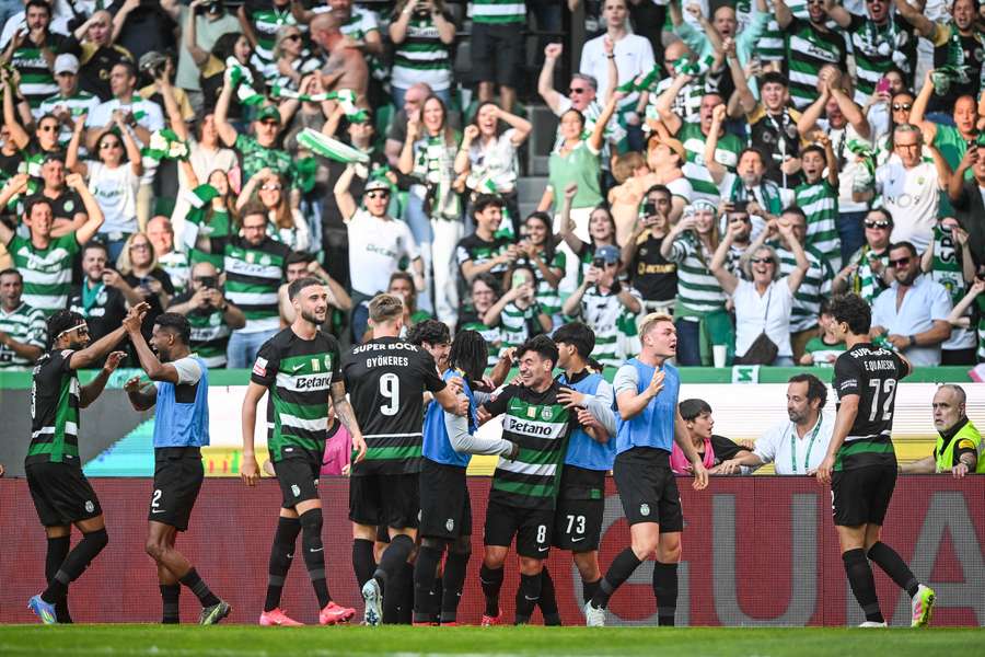 Sporting celebrate scoring