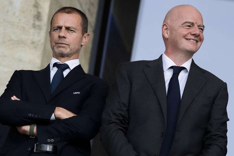 UEFA president Aleksander Ceferin (L) next to FIFA president Gianni Infantino UEFA president Aleksander Ceferin (L) next to FIFA president Gianni Infantino