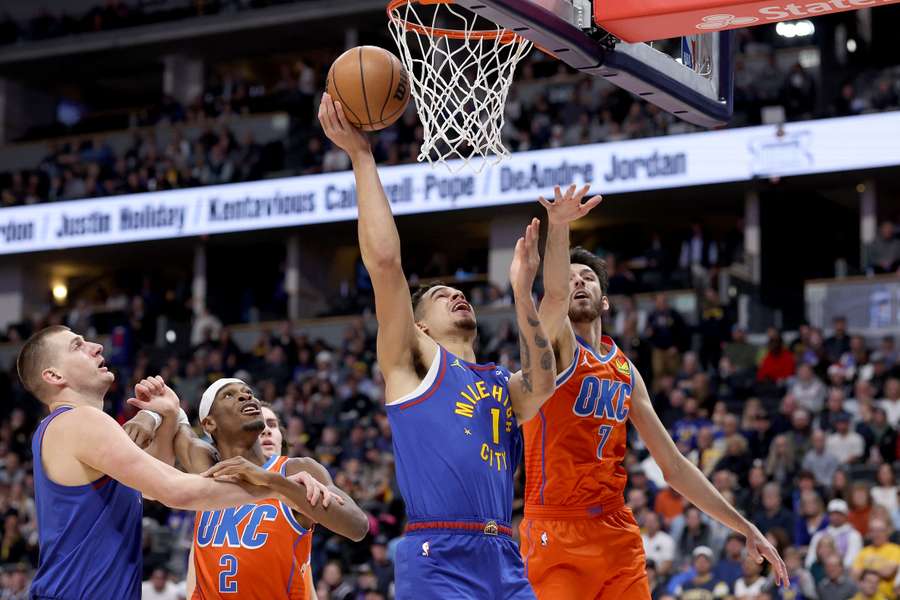 Warriors hold off Nets, Thunder stun NBA champion Nuggets