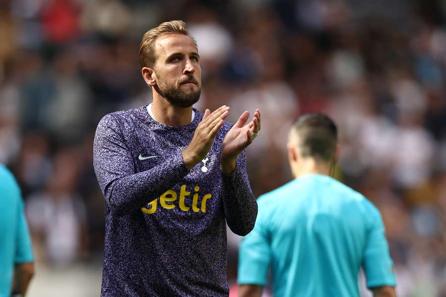 Kane applauds the Spurs fans after the game