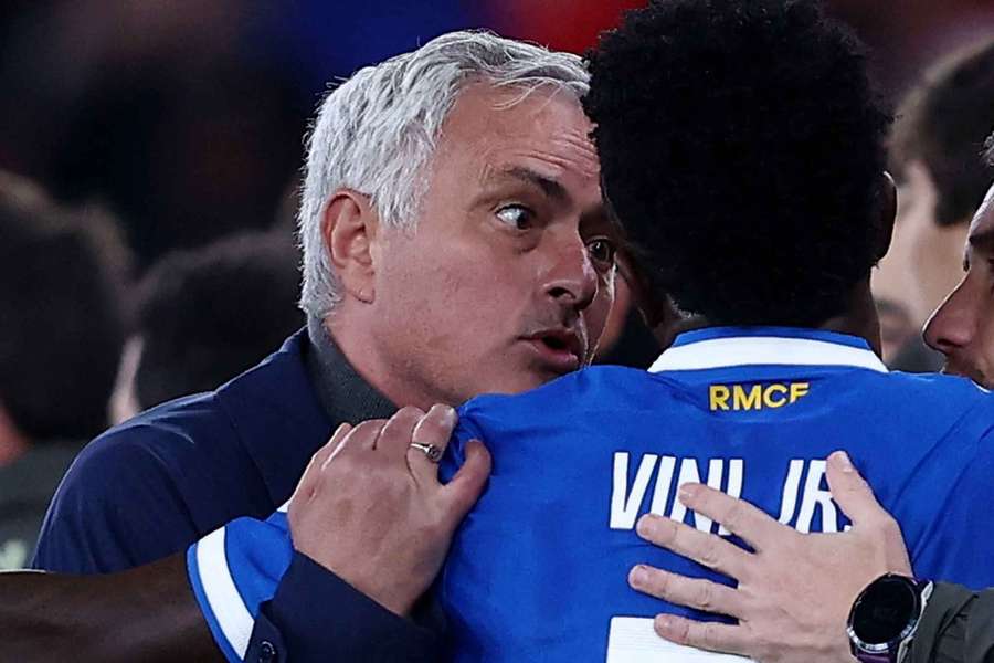 Real Madrid's Vinicius Junior with Benfica coach Jose Mourinho as the match was stopped due to racist chants