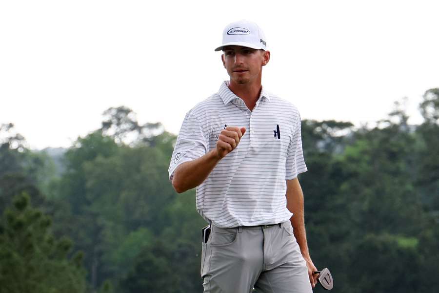 Sam Bennett acknowledges the crowd on the 18th green after completing his second round