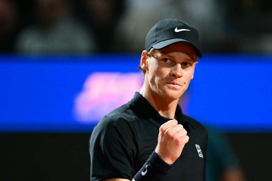 Jannik Sinner reacts during his men's singles semi-final match against Tommy Paul 