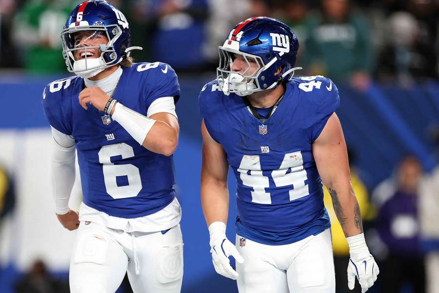 Giants QB Jaxson Dart (left) and RB Cam Skattebo (right) celebrate after a touchdown
