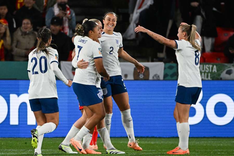 Alessia Russo celebrates after scoring the opening goal against China