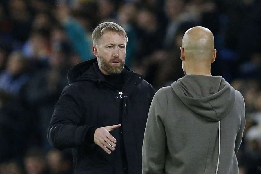 Chelsea manager Graham Potter shakes hands with Manchester City manager Pep Guardiola