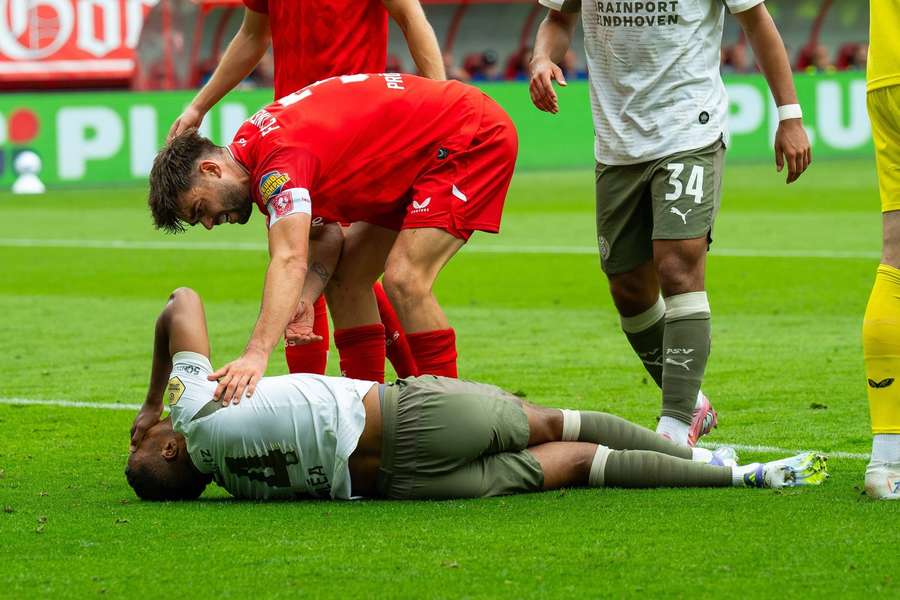 Alassane Plea went down injured after a duel with Robin Propper Alassane Plea went down injured after a duel with Robin Propper