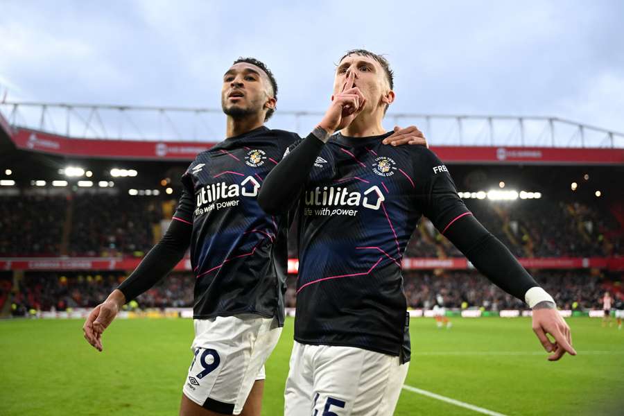 Alfie Doughty celebrates with Jacob Brown after scoring Luton's opening goal against Sheffield United