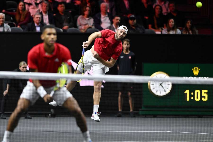 Auger-Aliassime (L) and Jack Sock in Laver Cup action.