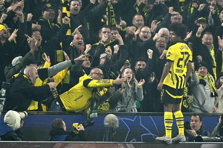 Dortmund's German forward #27 Karim Adeyemi celebrates scoring his team's second goal against Celtic