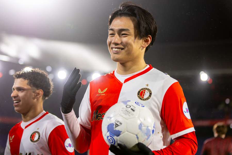 Feyenoord's Ayase Ueda poses with the game ball after scoring 4 goals against PEC Zwolle in December 2025