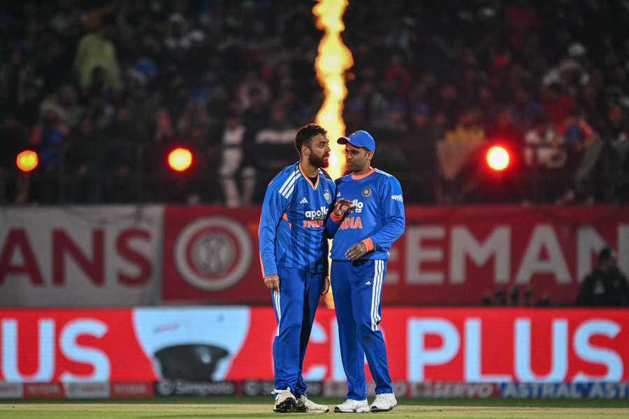 India's Varun Chakravarthy (left) celebrates with captain Suryakumar Yadav after taking the wicket of Donovan Ferreira India's Varun Chakravarthy (left) celebrates with captain Suryakumar Yadav after taking the wicket of Donovan Ferreira