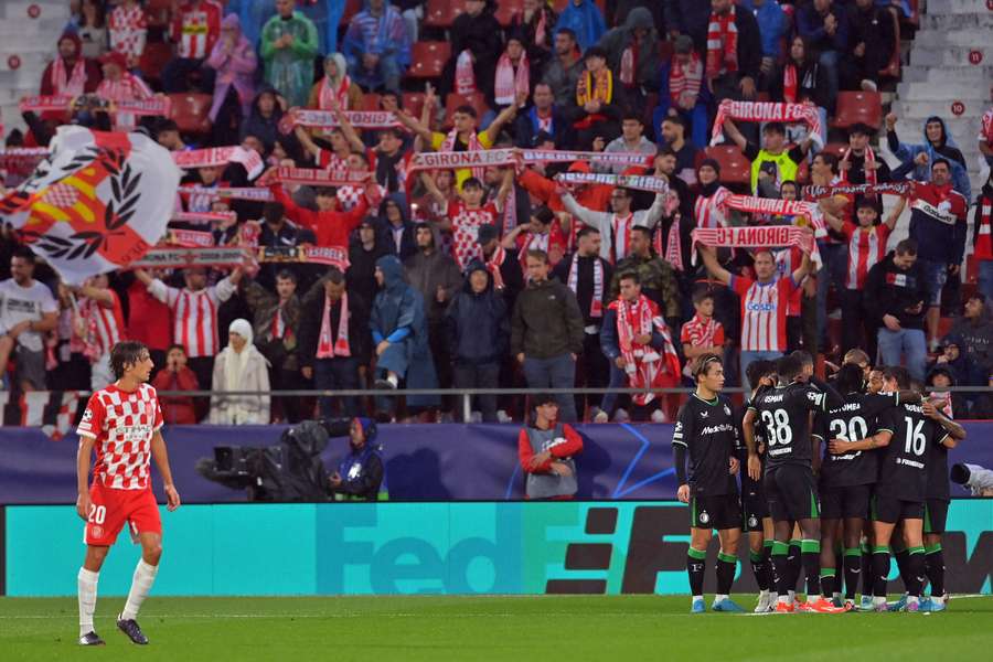 Feyenoord's players celebrate after Girona's Yangel Herrera (not seen) scored an own goal