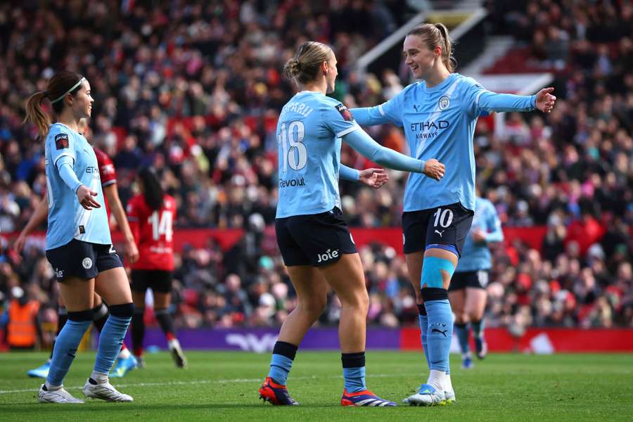Manchester City's Vivianne Miedema celebrates scoring their second goal with Kerstin Casparij
