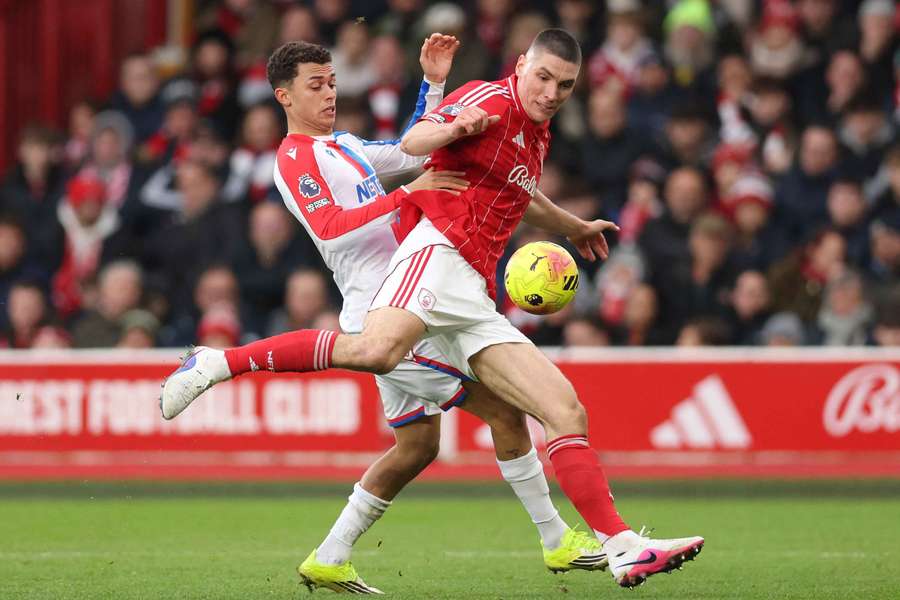 Crystal Palace's Brennan Johnson in action with Nottingham Forest's Nikola Milenkovic