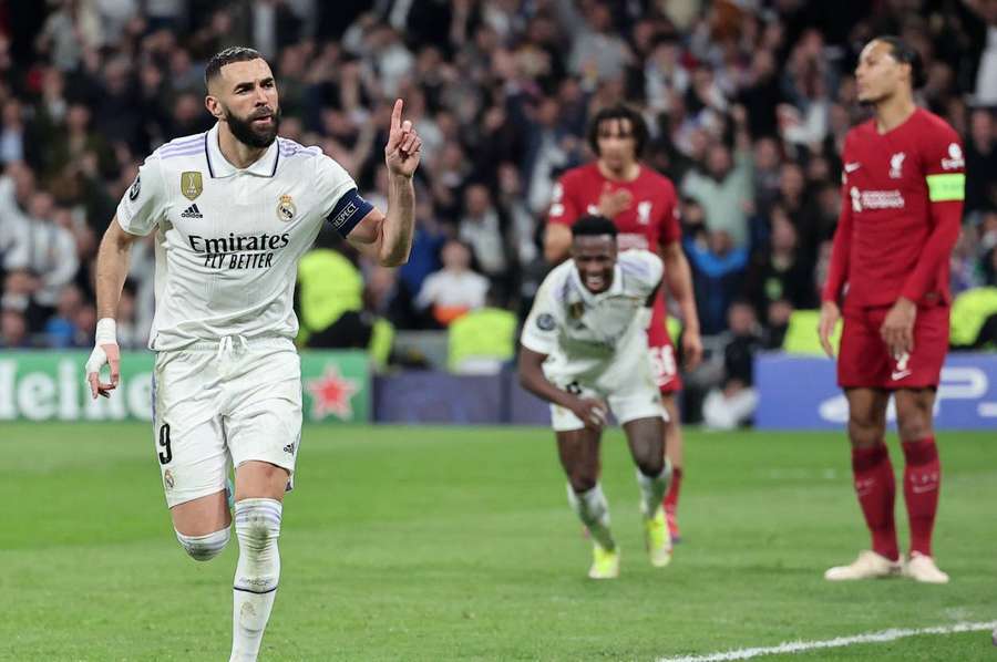 Karim Benzema celebrates scoring for Real Madrid in the 79th minute to put the tie beyond Liverpool's reach