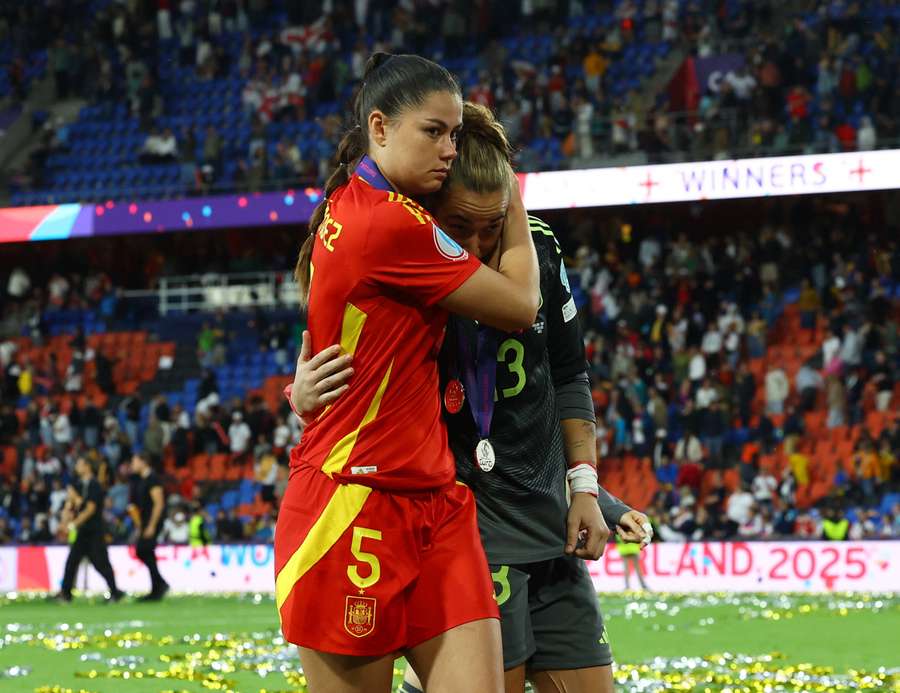 Maria Mendez of Spain and Catalina Coll look degenerate after match